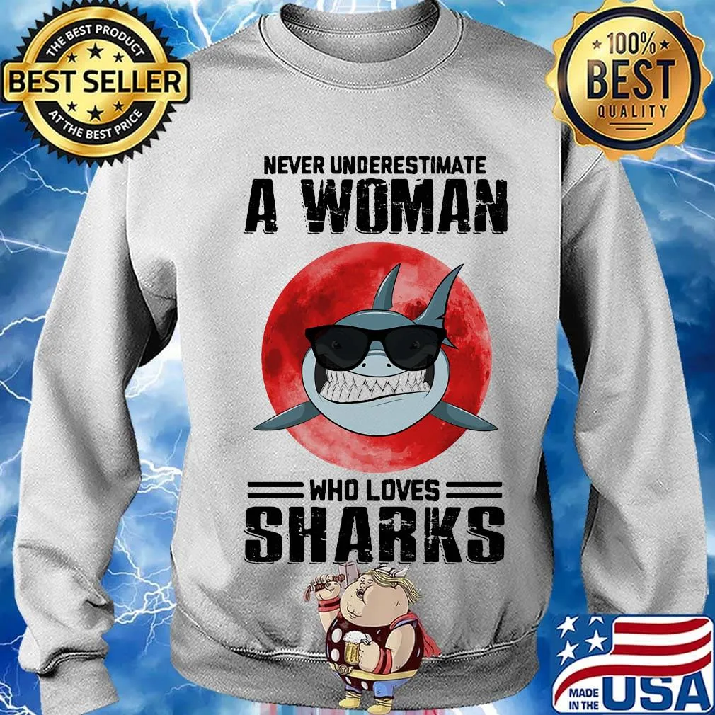 Never underestimate a woman who loves sharks sunset s Sweater