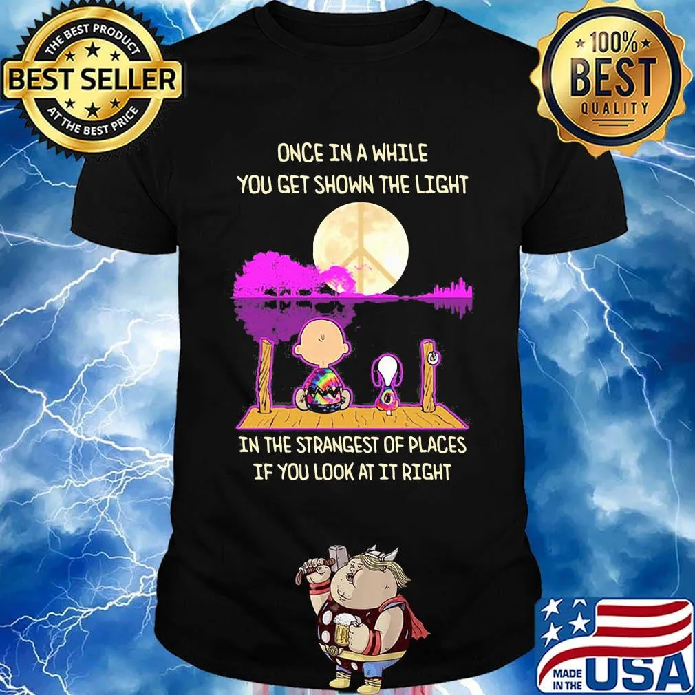 Charlie brown and snoopy once in a while you get shown the light in the strangest of places if you look at it right shirt
