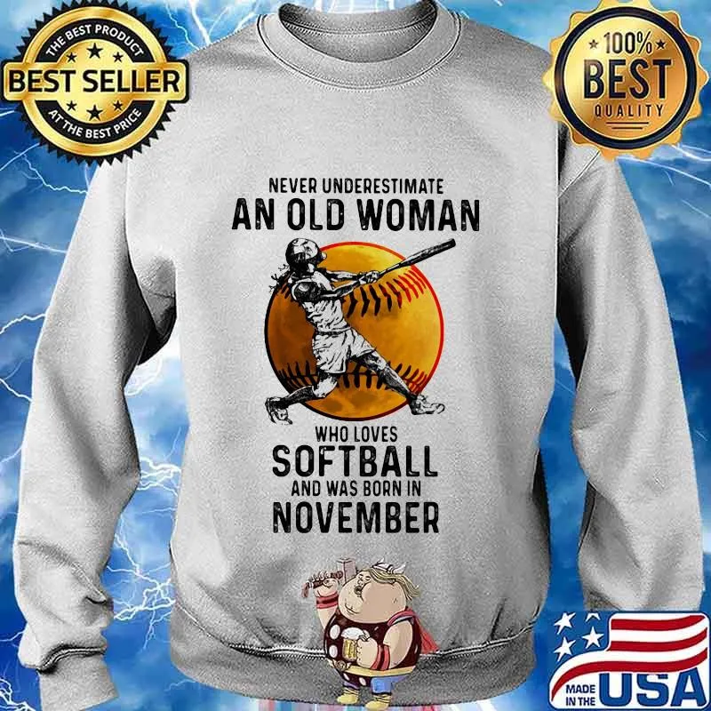 Never underestimate an old woman who loves softball and was born in november s Sweater