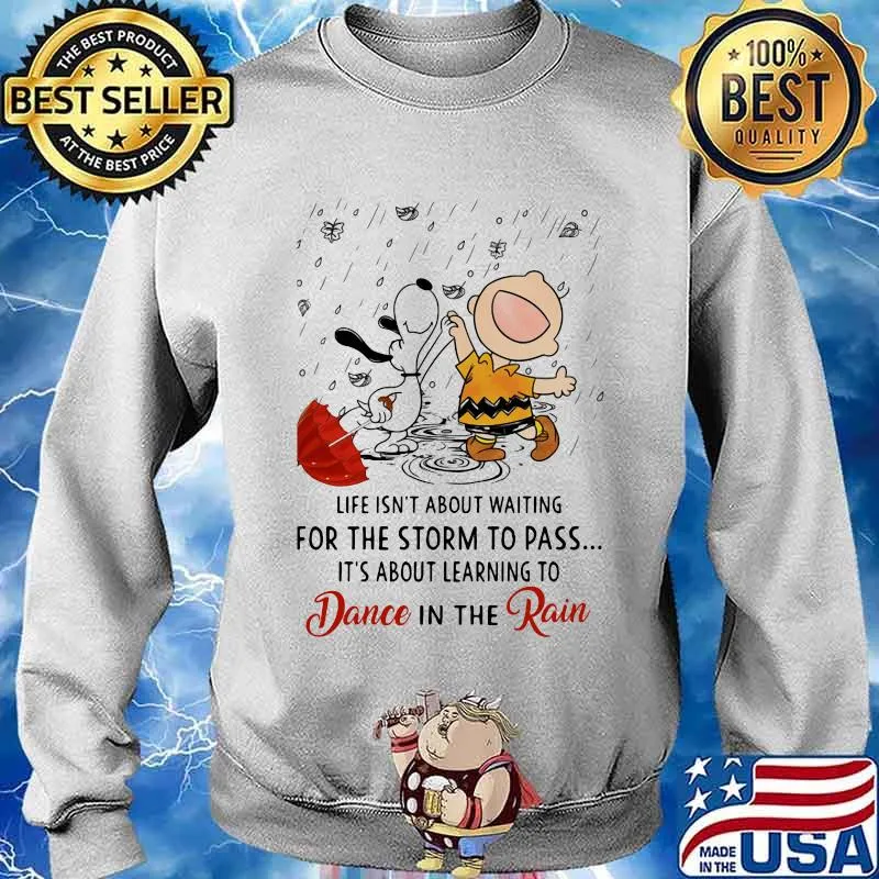 Life Isn’t About Waiting For The Storm To Pass Its About Learning To Dance In The Rain Snoopy And Charlie Shirt Sweater