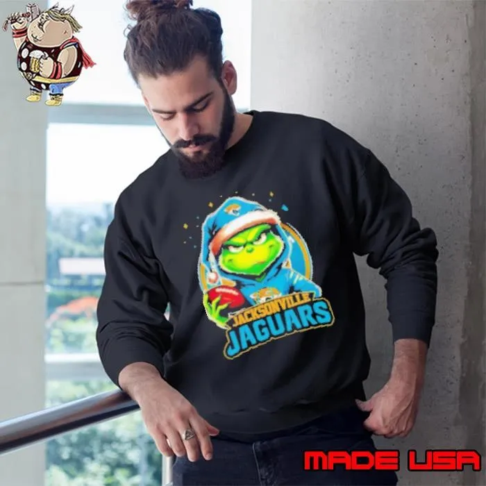 Jacksonville Jaguars Grinch wearing Santa hat Christmas 2024 Sweatshirt