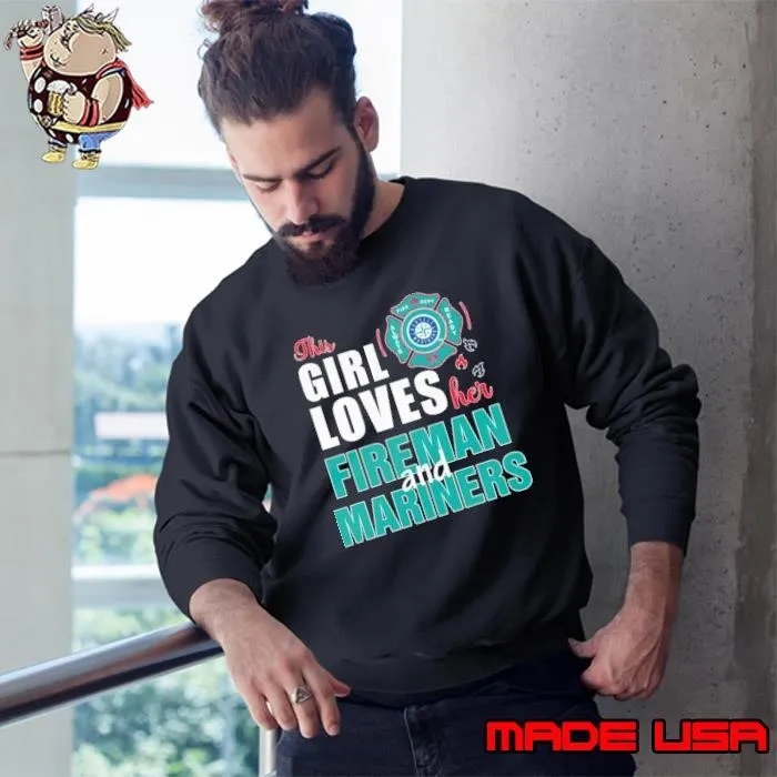 This girl loves her fireman and Seattle Mariners shirt
