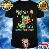 Dinosaur T Rex Rockin to a different tune Autism awareness shirt