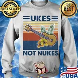 Music ukes not nukes flowers vintage s Sweater