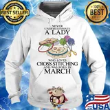 Never underestimate a lady who loves cross stitching and was born in march s Hoodie