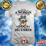 Never underestimate an old woman who loves dogs paw and was born in december shirt