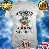 Never underestimate an old woman who loves dogs paw and was born in november shirt