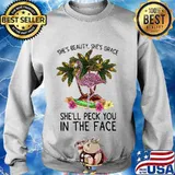 Flamingo she's beauty she's grace she'll peck you in the face flowers s Sweater