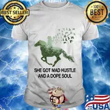 Riding horse she got mad hustle and a dope soul shirt