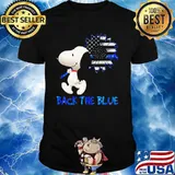 Snoopy holding sunflower back the blue american flag shirt