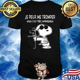 Snoopy je peux me tromper mais c'est tres improbable shirt