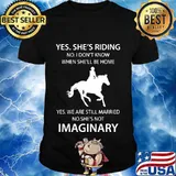 Yes she's riding yes we are still married no she's not imaginary shirt