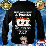Never underestimate a woman who loves cats and was born in july s Sweater
