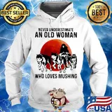 Never underestimate an old woman who loves mushing sunset s Hoodie
