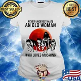 Never underestimate an old woman who loves mushing sunset s Ladies tee