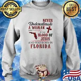 Never underestimate a woman covered by the blood of jesus and was born in florida s Sweater