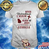Never underestimate a woman covered by the blood of jesus and was born in georgia shirt