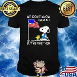We dont know them all but we owe them snoopy flag shirt