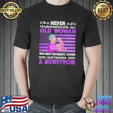 Never Underestimate An Old Woman Who Beat Pancreatic Cancer And Because A Survivor America Flag Shirt Unisex