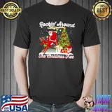 Nice Santa claus riding Rockin’ around the Christmas tree shirt