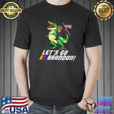 Premium Donald Trump riding dinosaur let’s go brandon American flag shirt