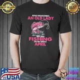 Premium Never underestimate an old lady who loves fishing and was born in april Unisex