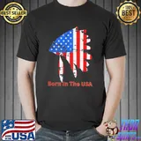 Native American headdress and born in the usa flag shirt