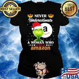 Never Underestimate A Woman Who Works At Amazon Bell Grinch Shirt Ladies tee