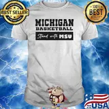 Michigan basketball stand with MSU shirt
