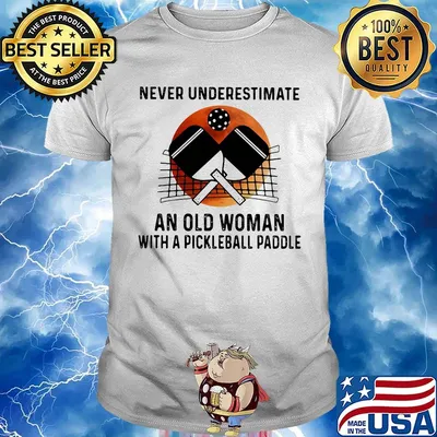 NEVER UNDERESTIMATE AN OLD WOMAN WITH A PICKLEBALL PADDLE SUNSET SHIRT