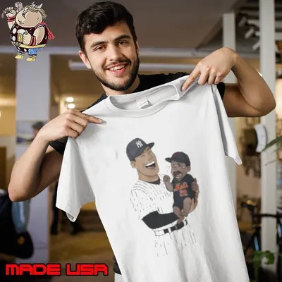 Yankees holding crying Mets baby shirt